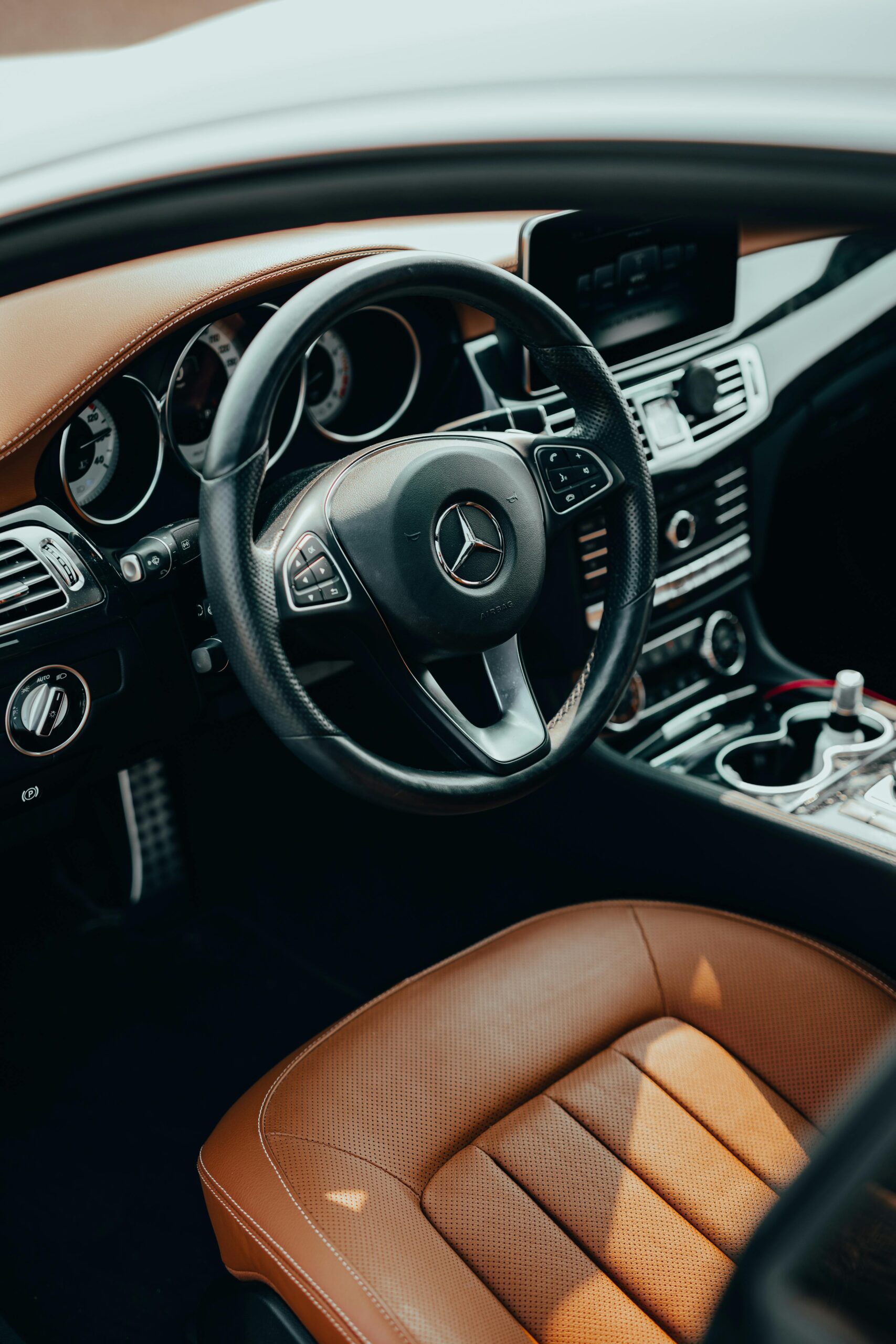 High-quality interior of a luxury vehicle showcasing leather seats and advanced technology dashboard.